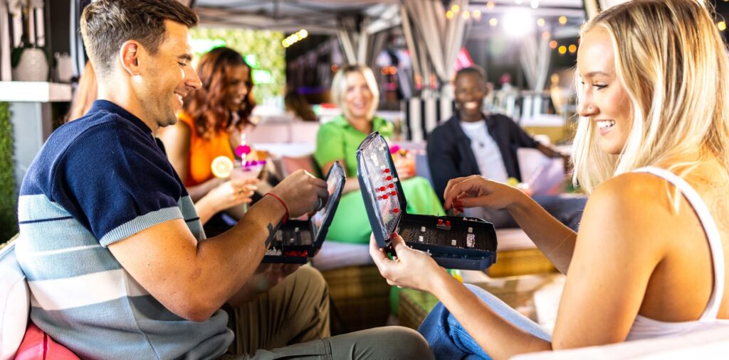 Throw Social DC multi-activity venue with axe lanes, shuffleboard and DJ, Ivy City